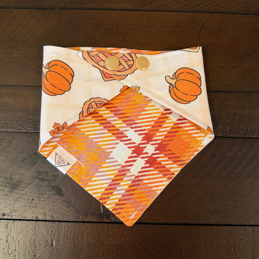 Cream pet bandana with whole pies, pie slices, and orange maple leaves.